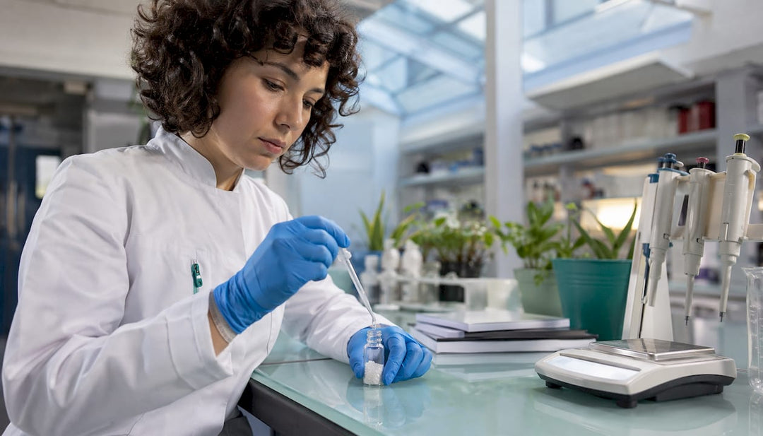 Scientist preparing nasal spray peptide solution in lab
