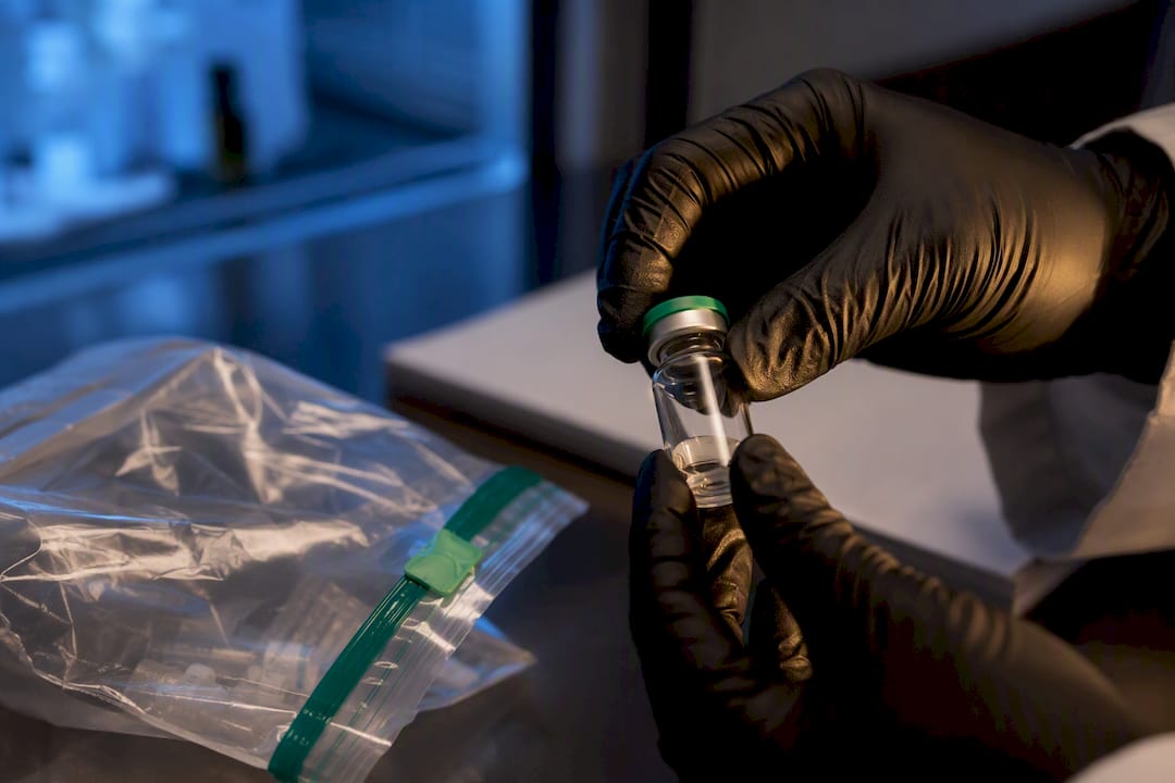 Technician checking anonymous vial custody